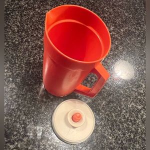 Tupperware child size pitcher vintage. Great condition. Fun memories